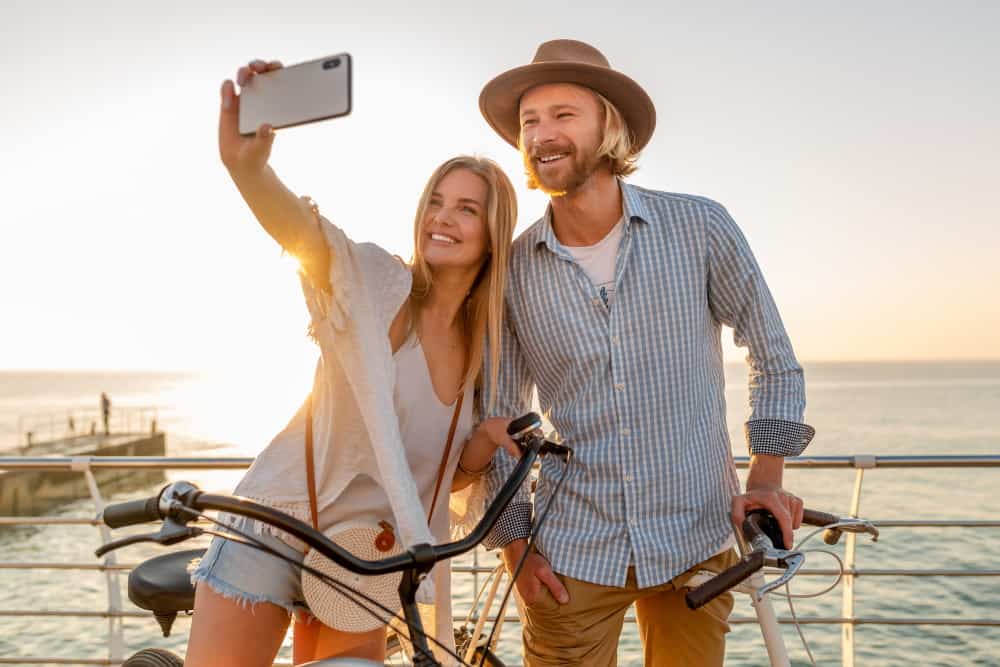 attractive happy couple traveling in summer on bic 2021 04 06 06 36 24 utc