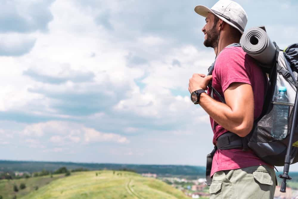 male tourist in hat with backpack looking at summe 2021 06 14 23 03 31 utc 1